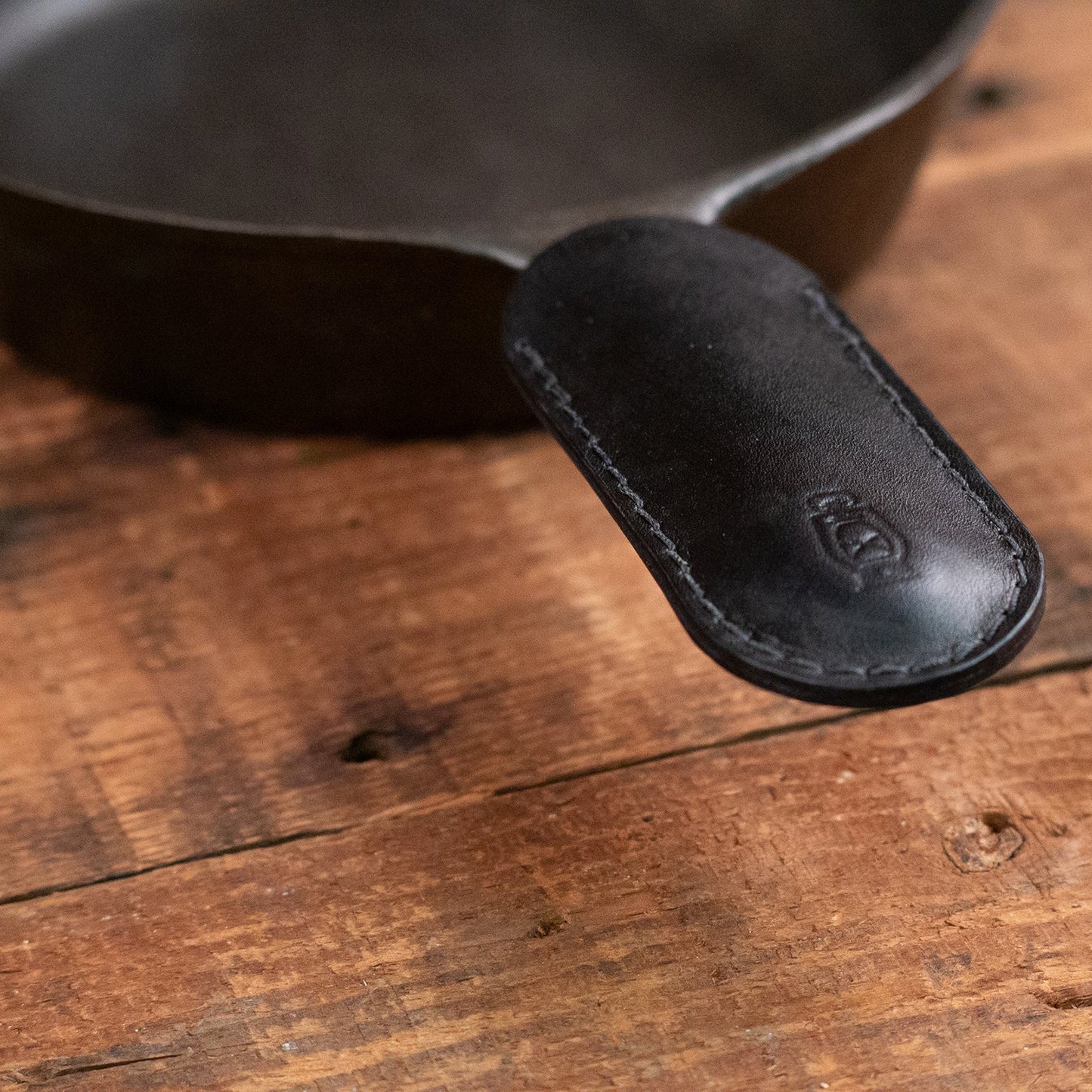 Detail shot of Cast Iron Mitten in Black Leather