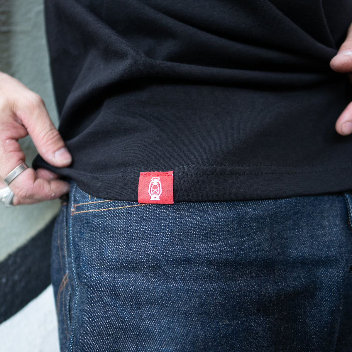 Dark Forest Signature Tee in Black with red woven label accent
