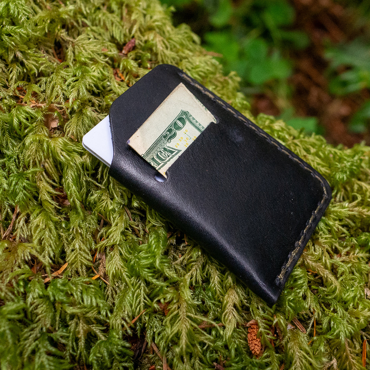 Detail of the Rustler Mini Wallet in Black Leather by Dark Forest