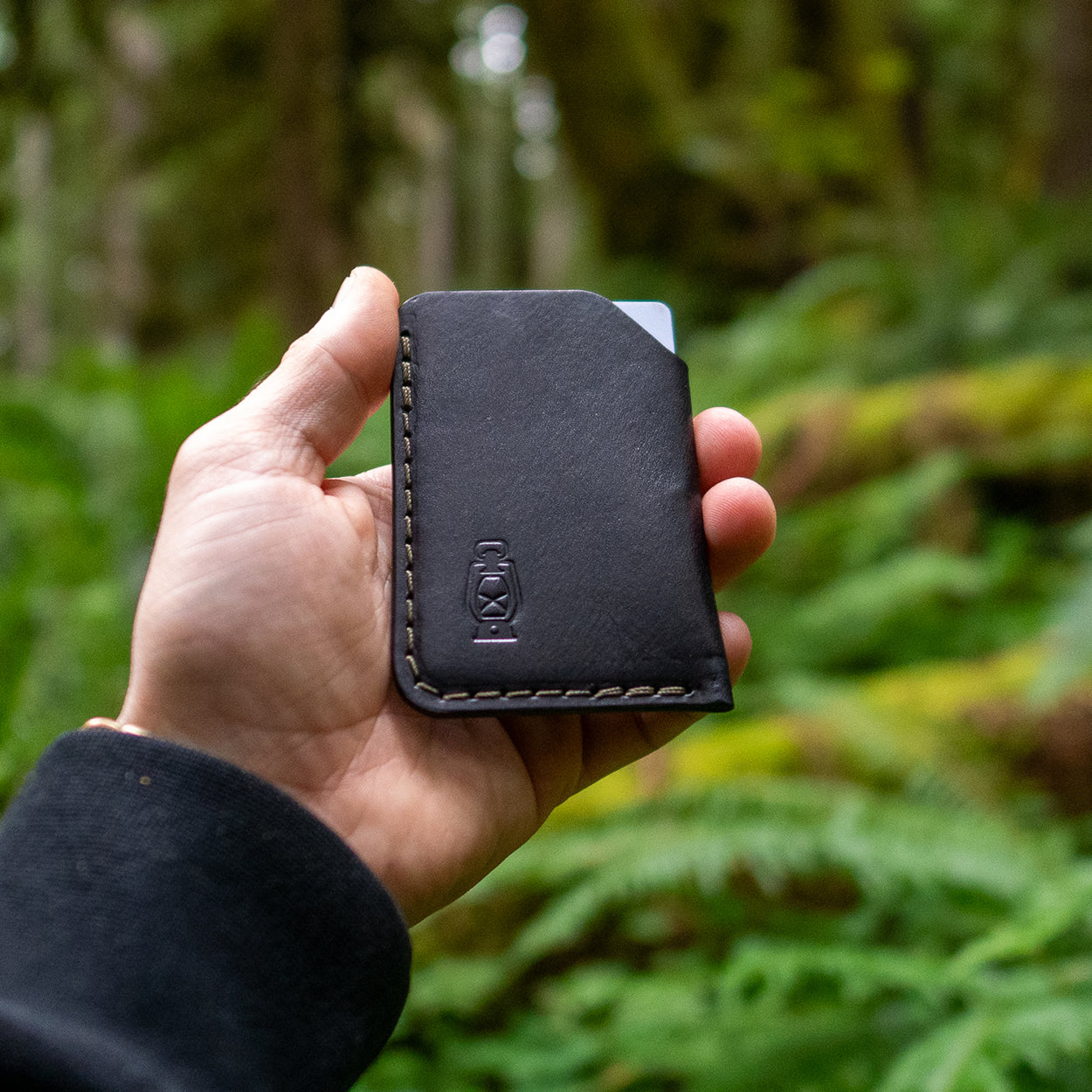 In the forest with the Rustler Mini Wallet in Black Leather by Dark Forest