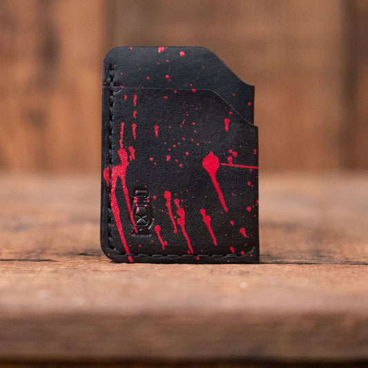 Rustler Card wallet in black splatter by Dark Forest