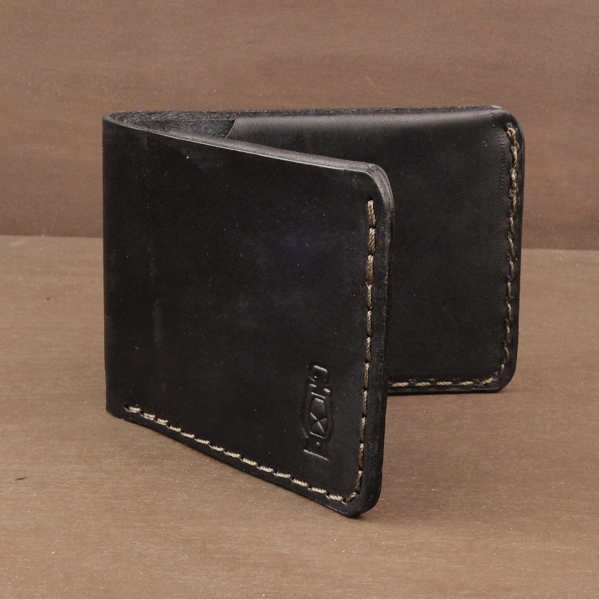 Black leather wallet made from full grain leather in a small and thin profile