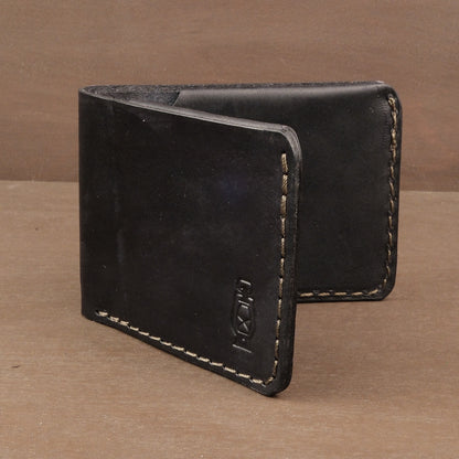 Black leather wallet made from full grain leather in a small and thin profile