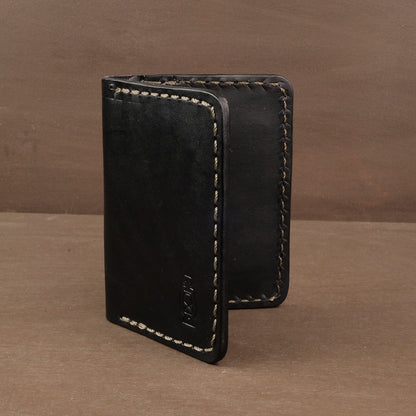 Black vertical leather wallet  made from full grain leather in Portland OR