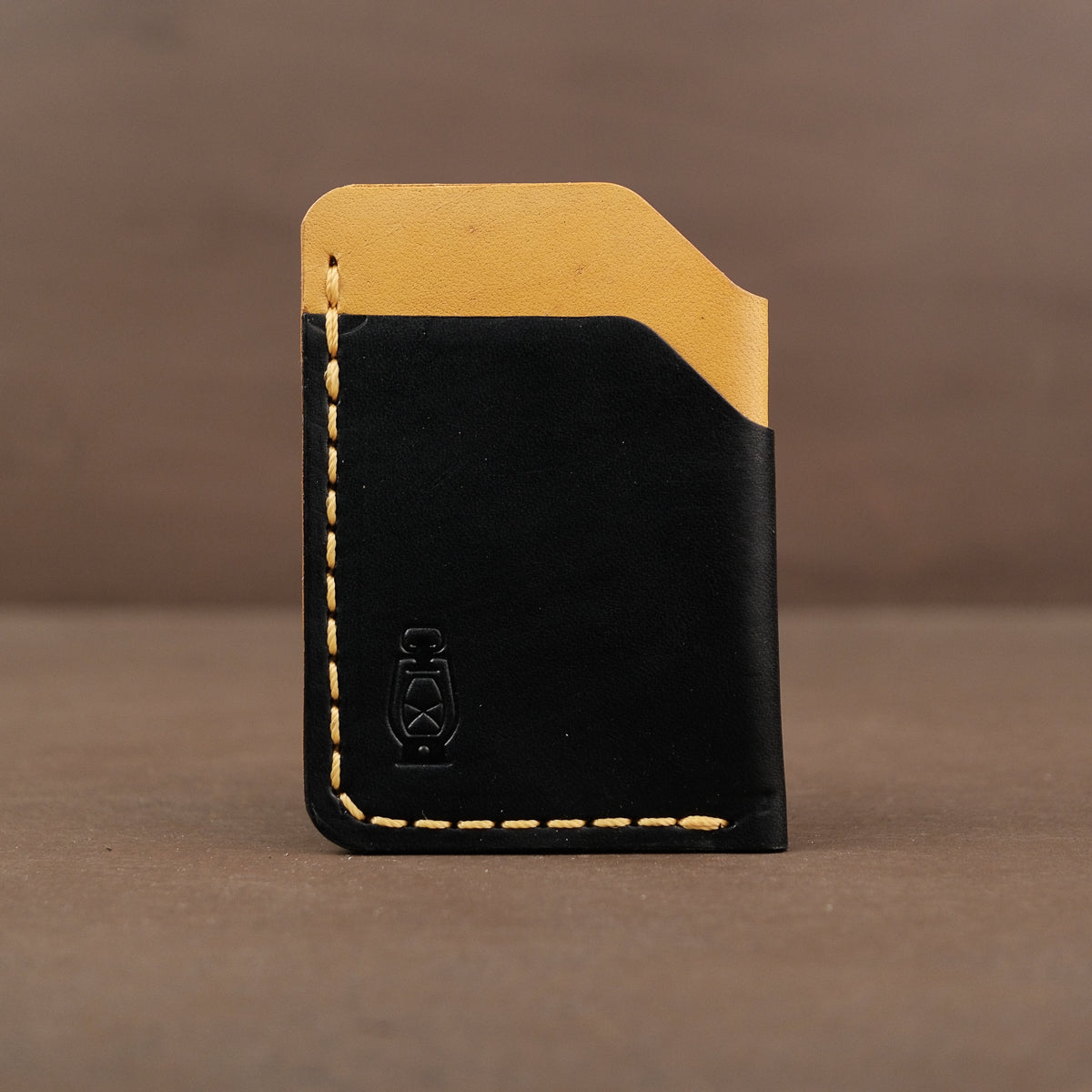 Black and yellow SS26 leather wallet made by dark forest in portland oregon