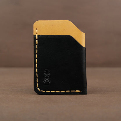 Black and yellow SS26 leather wallet made by dark forest in portland oregon
