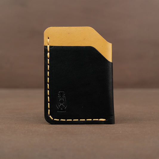 Black and yellow SS26 leather wallet made by dark forest in portland oregon