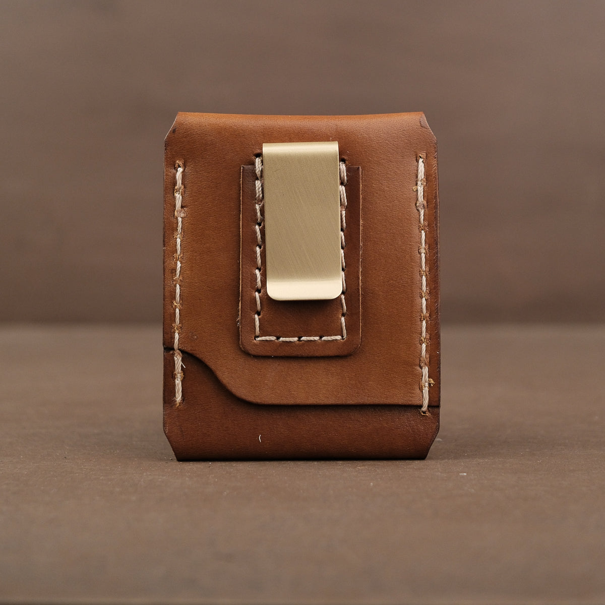 Brown card wallet made from full grain veg tan leather with money clip