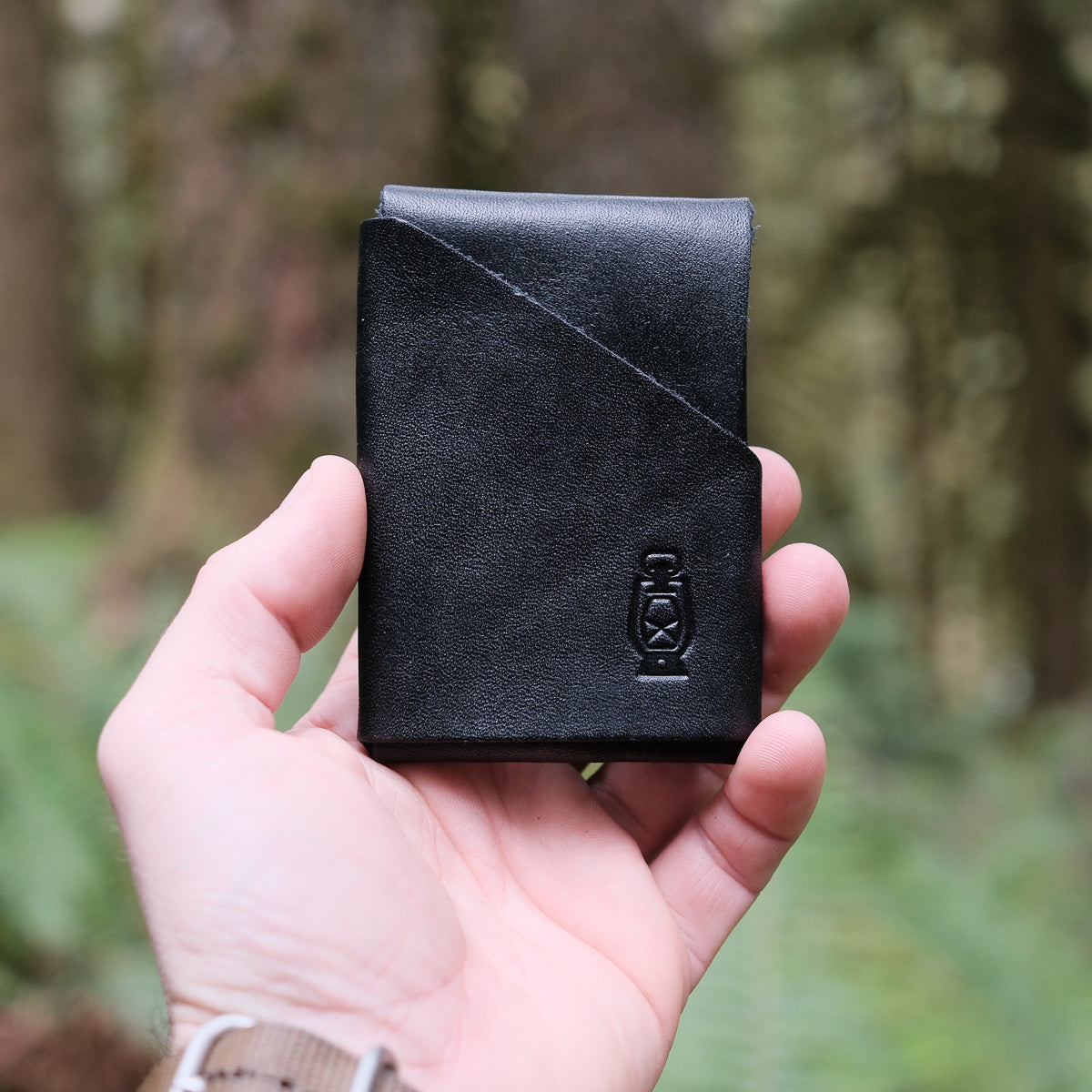 black full grain veg tan minimalist stitchless leather wallet handmade in USA