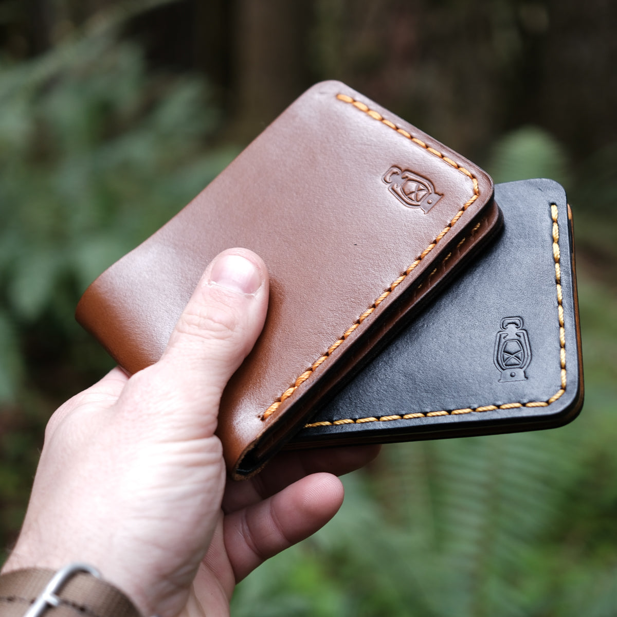 Handcrafted leather bifold wallets made from full grain veg tan leather