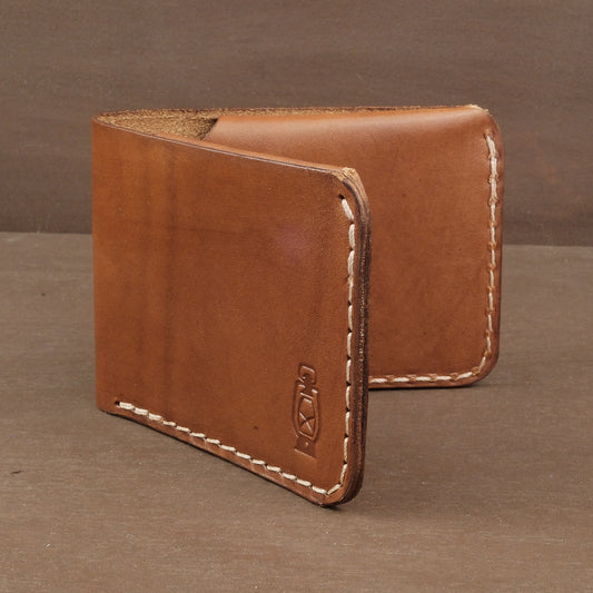 Brown leather wallet made to be small and minimalist