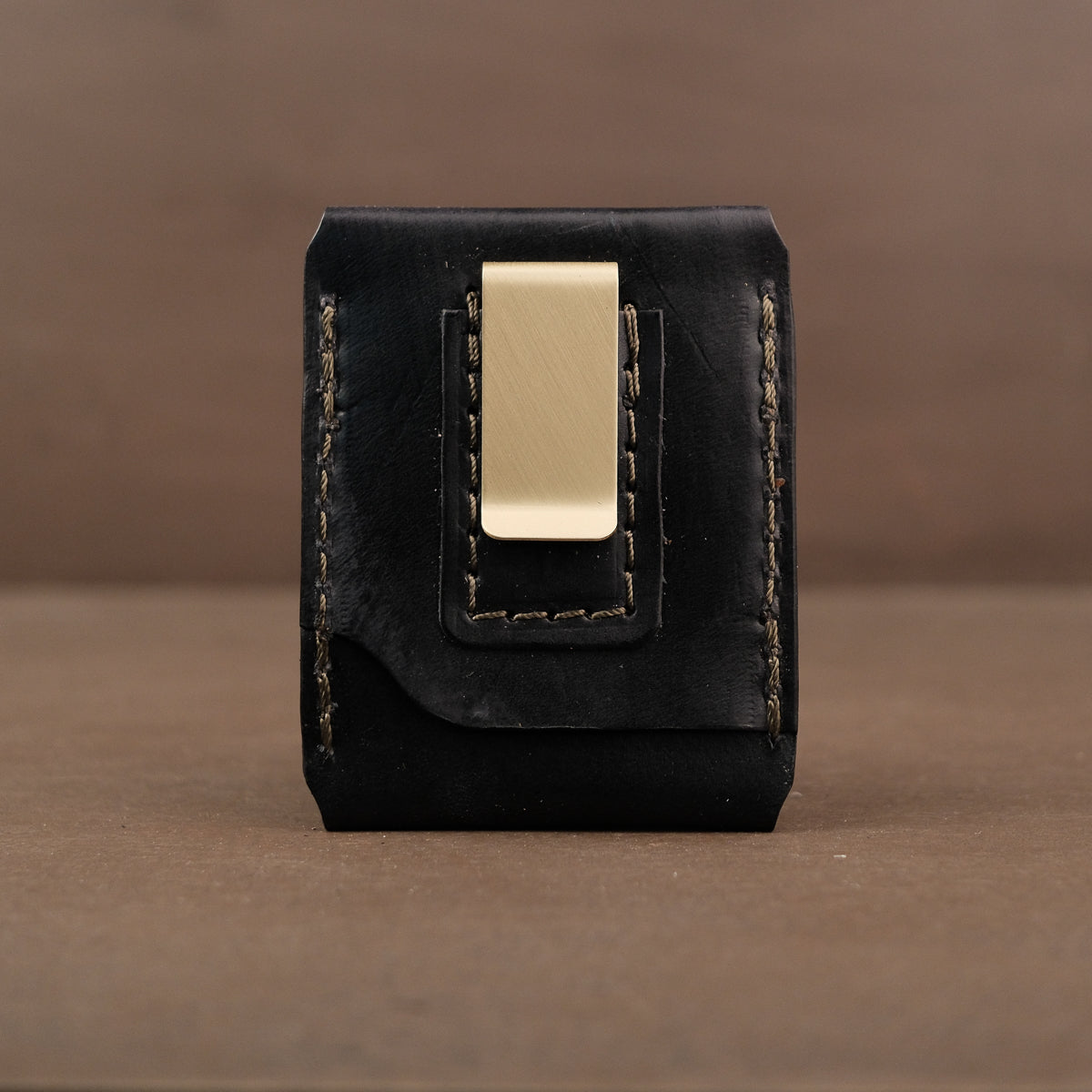 Black card wallet made from full grain veg tan leather and money clip